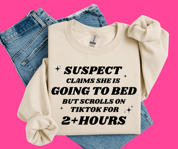 Suspect Claims She's Going To Bed, But Scrolls TikTok for 2+ Hours Tan Sweatshirt - Tees & Sweatshirts - The Red Rival